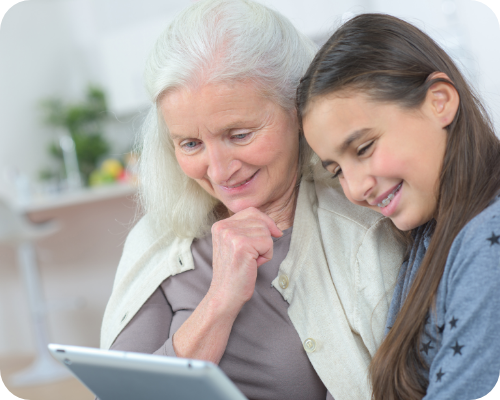 Two women looking at dental plans